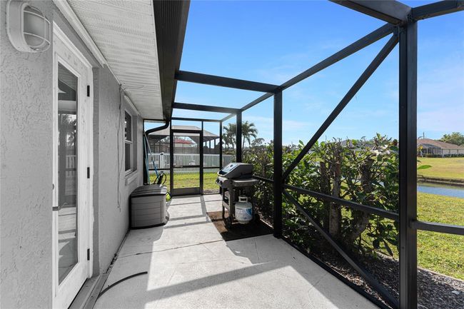Door to the Guest/Pool bath and room for your grill | Image 40