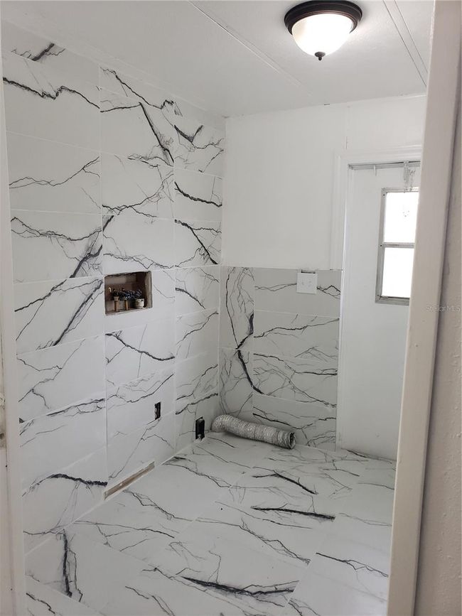 6997 Chestnut Dr, House other with 3 bedrooms, 2 bathrooms and null parking in Cocoa FL | Image 36