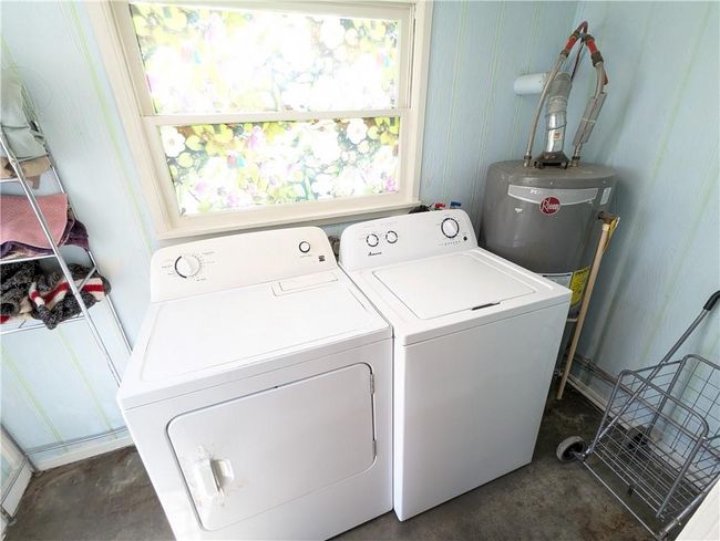 Laundry area featuring water heater, washer and dryer, and laundry area | Image 20