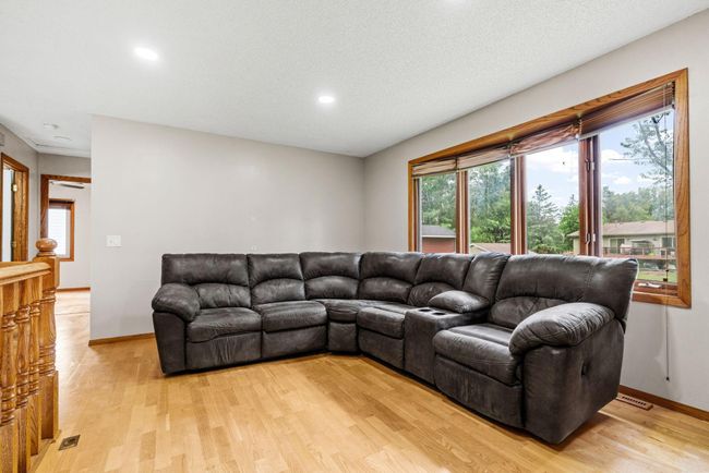 Natural light pours into the upper-level living room! | Image 15