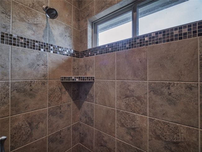 Bathroom view of tiled shower | Image 26