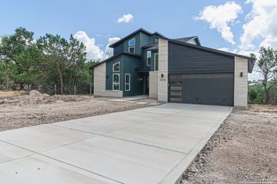 1318 Mountain Top Loop, House other with 4 bedrooms, 3 bathrooms and null parking in Canyon Lake TX | Image 3