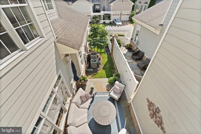 18985 Coreopsis Ter, Townhouse with 3 bedrooms, 4 bathrooms and null parking in LEESBURG VA | Image 50