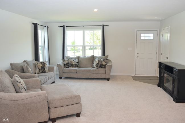 welcoming great room at front of home | Image 13