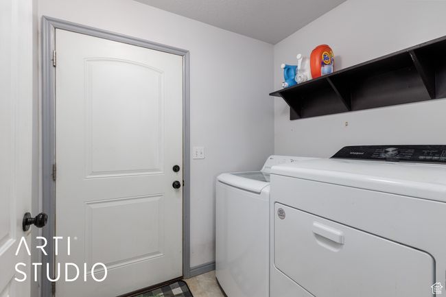 Washroom with separate washer and dryer | Image 19