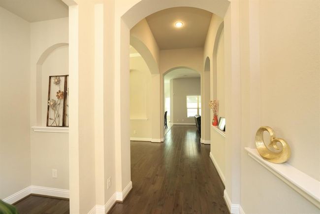 Foyer with hallway to bedrooms and study | Image 5