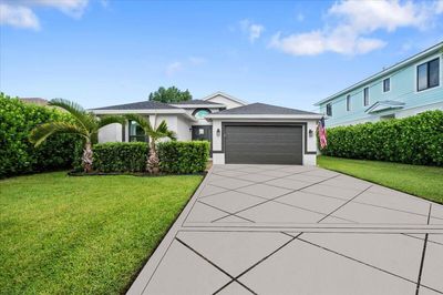 6430 Barbara Street, House other with 3 bedrooms, 2 bathrooms and null parking in Jupiter FL | Image 1