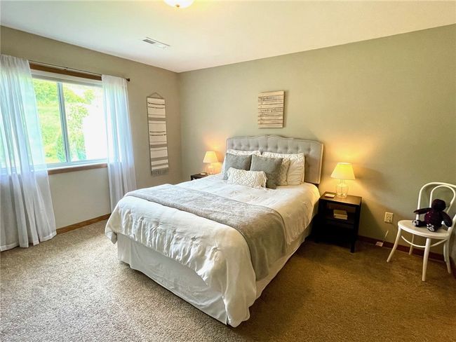 Nice primary suite with neutral colors, spacious walk in closet and great master full bath! | Image 13