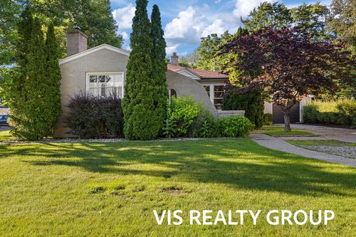 303 E Savidge St, Spring Lake, MI, 49456-1727 | Card Image