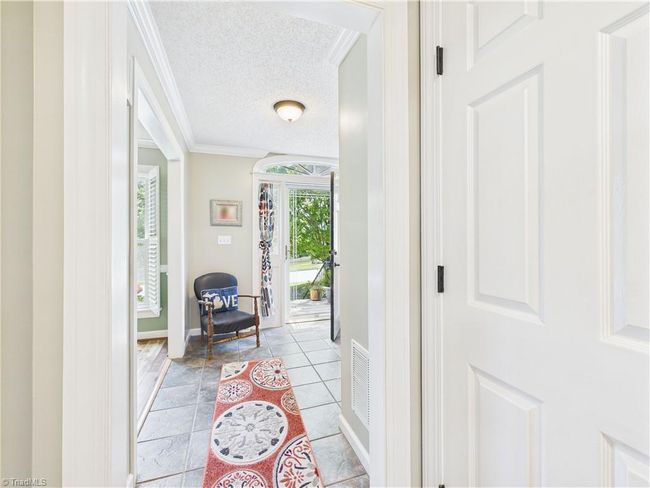 Lots of natural light streaming in from the front entrance. | Image 19