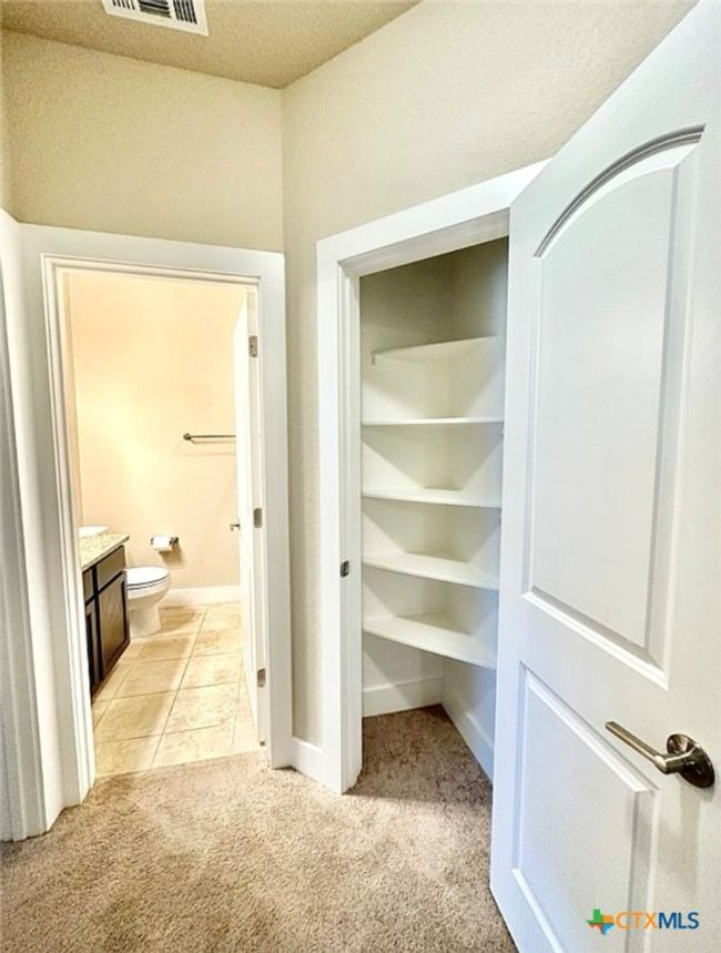 upstairs bath and hall closet | Image 15