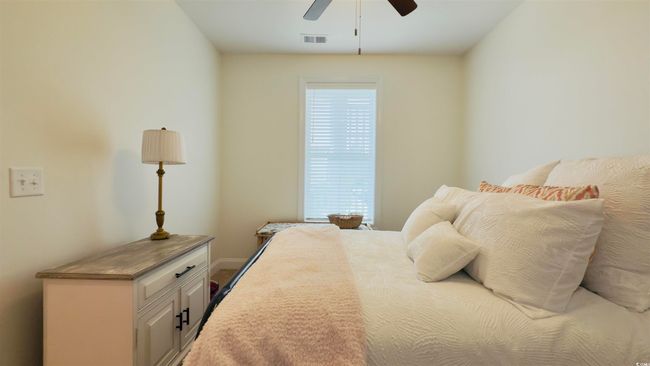 Bedroom with baseboards and ceiling fan | Image 8
