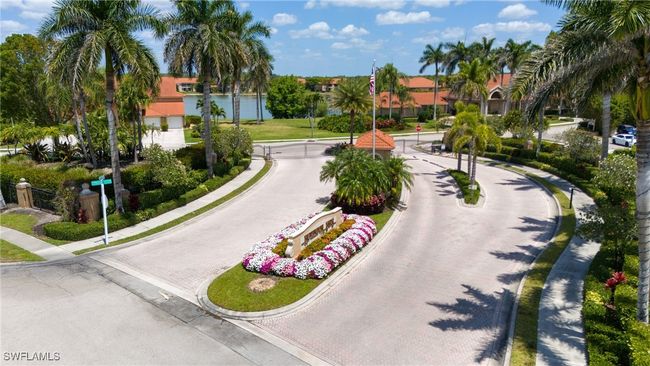 View of main gated entrance into Huntington Lakes community. | Image 38