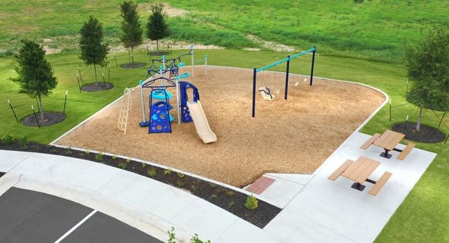 Playground and picnic area are perfectly situated next to the pool. | Image 39