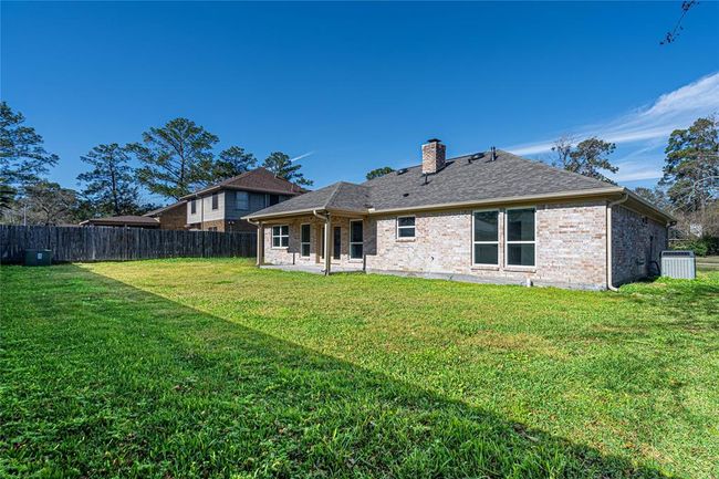 8006 17 Th Green Dr, House other with 3 bedrooms, 2 bathrooms and 2 parking in Humble TX | Image 30