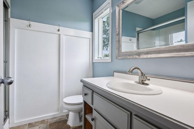 There is also an adjoining bath and a walk in closet | Image 16