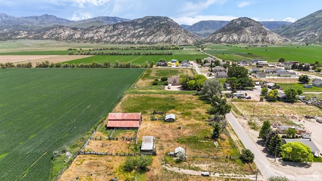 Overview of rural landscape with a mountainous background and farmland | Image 7