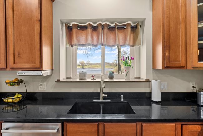 Granite counters w/sink window overlooking lake | Image 25