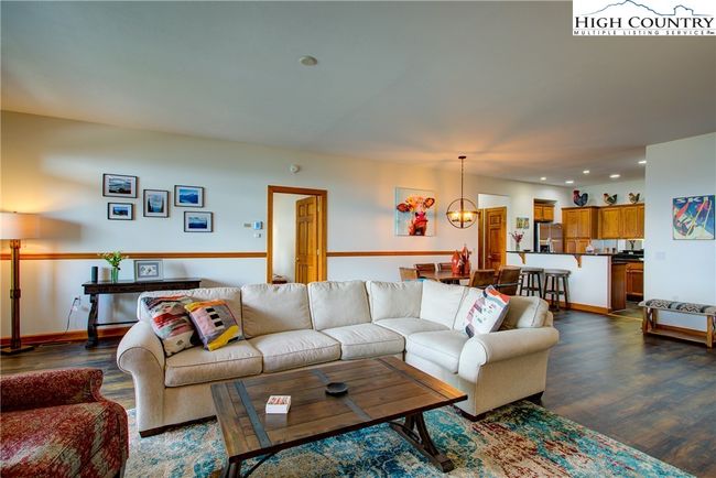 Upgraded features include solid hardwood doors and trim. You'll love the copious open spaces, perfect for entertaining. | Image 11