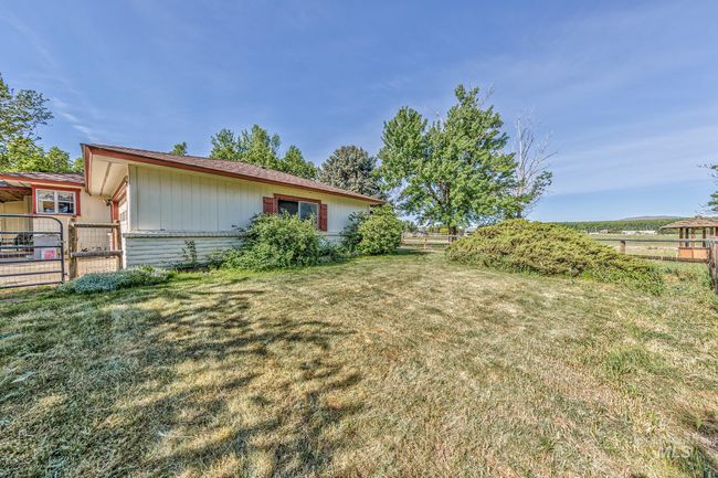 View of yard with a gate | Image 43