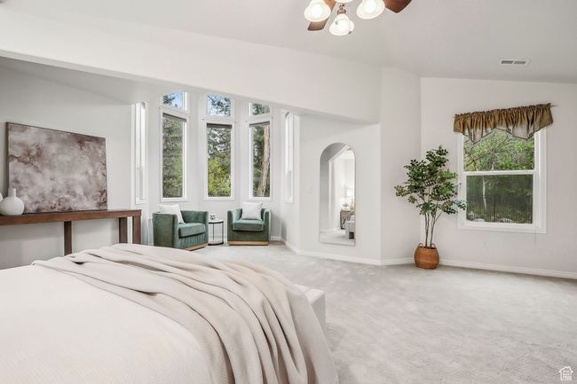 Carpeted primary suite + sitting area overlooking the creek | Image 12