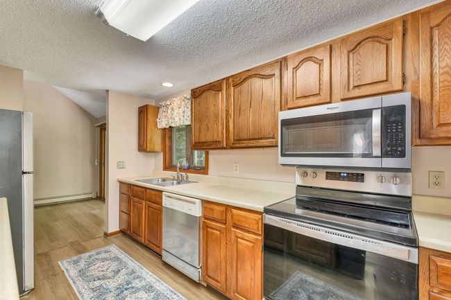 UNIT-5 - 2393 Lake Shore Rd, House other with 3 bedrooms, 2 bathrooms and null parking in Gilford NH | Image 17