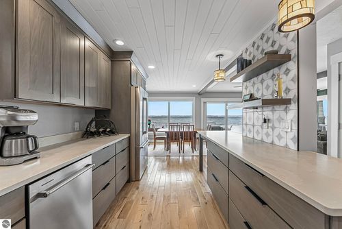 5648 Mackenzie Drive, Kewadin, MI, 49648 | Card Image