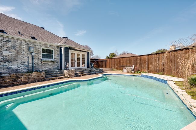 View of swimming pool featuring a fenced in pool, french doors, and​​‌​​​​‌​​‌‌​‌‌​​​‌‌​​‌‌​‌​​​​​‌ fence | Image 28