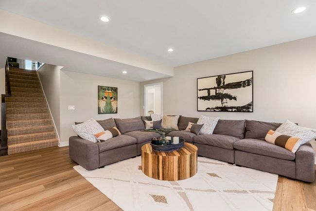 Lower level Rec area with 2 bedrooms and full bath. Photos of previous model home. Not actual listing. Features and sizes may vary. Contact agent for details & showings! | Image 23