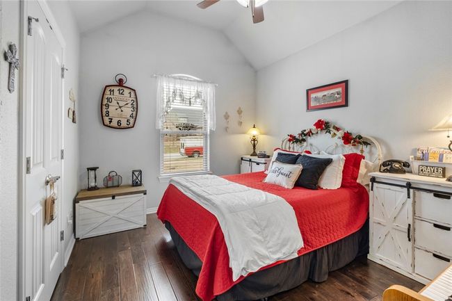 Bedroom 2 just off the front entrance. It has its own bathroom for your guest and it does open to the main house for visitors use. | Image 24
