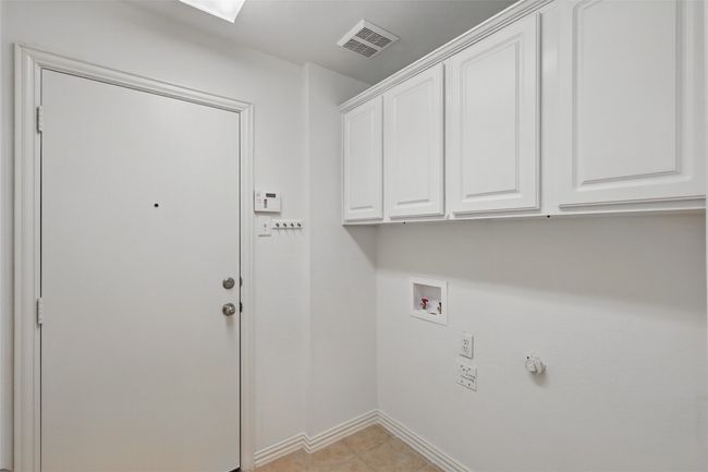 Laundry Room leads into the Garage | Image 21