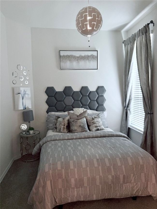 Main-Level Bedroom – Complete with an adjacent full bathroom, ideal for guests or multi-generational living. | Image 19