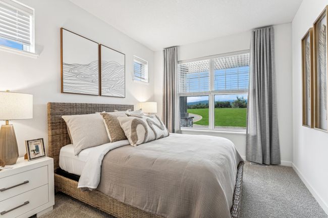 Photo is of the actual model. The secondary bedroom is perfect for guests! | Image 12