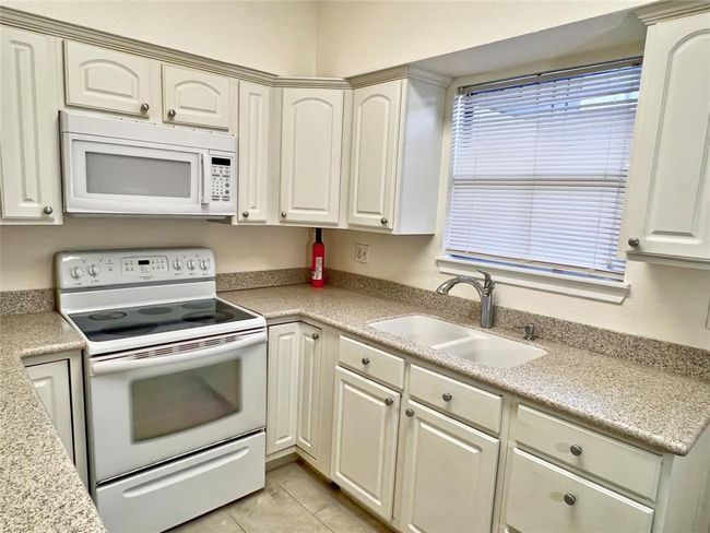Kitchen over looking Patio | Image 10