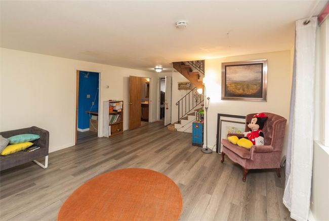 Family room with new luxury vinyl plank flooring | Image 15