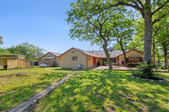 The trees provide nice shade to the yard. | Image 25