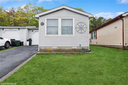 87 Village Cir W, Manorville, NY, 11949-9699 | Card Image