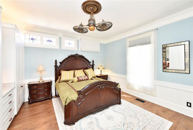 The downstairs bedroom with tons of builtins. | Image 38