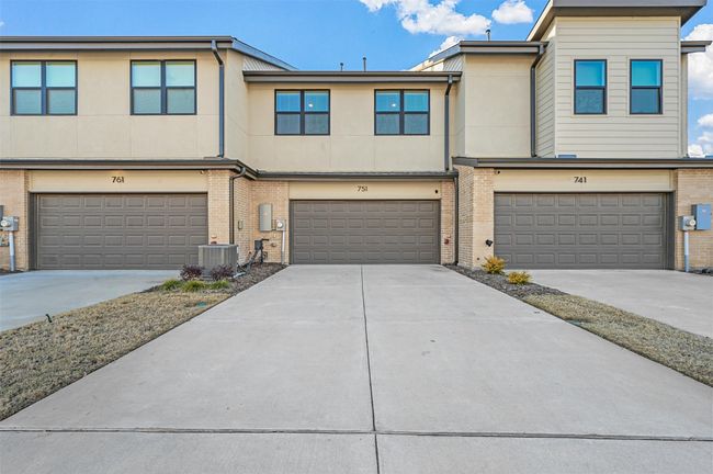 View of property featuring a garage and central AC​​‌​​​​‌​​‌‌​‌‌​​​‌‌​​‌‌​‌​​​​​‌ unit | Image 29
