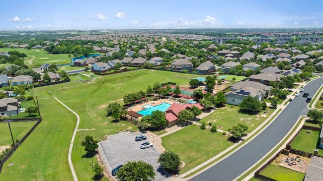 Aerial view of residential area with a pool area | Image 37