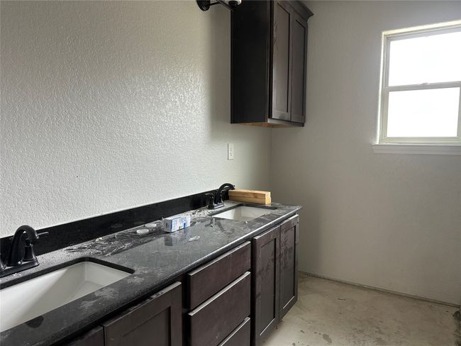 Laundry area featuring a sink | Image 16