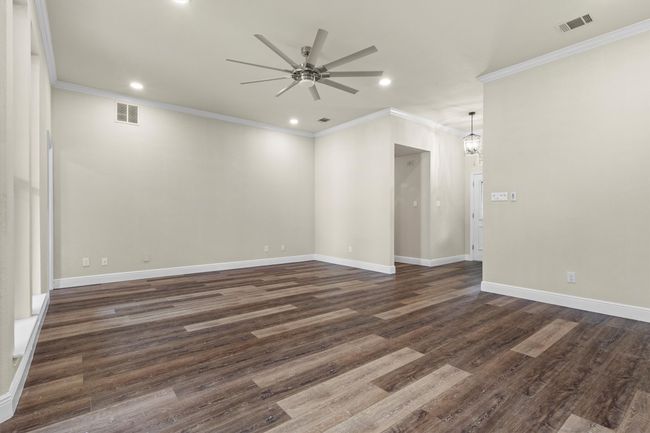 A view of the living room from the breakfast area. | Image 9