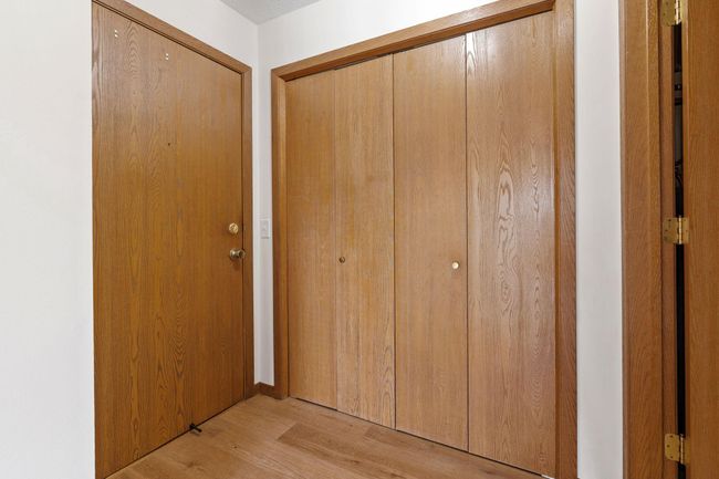 An entryway closet is essential to hide coats, shoes & other belongings! | Image 21