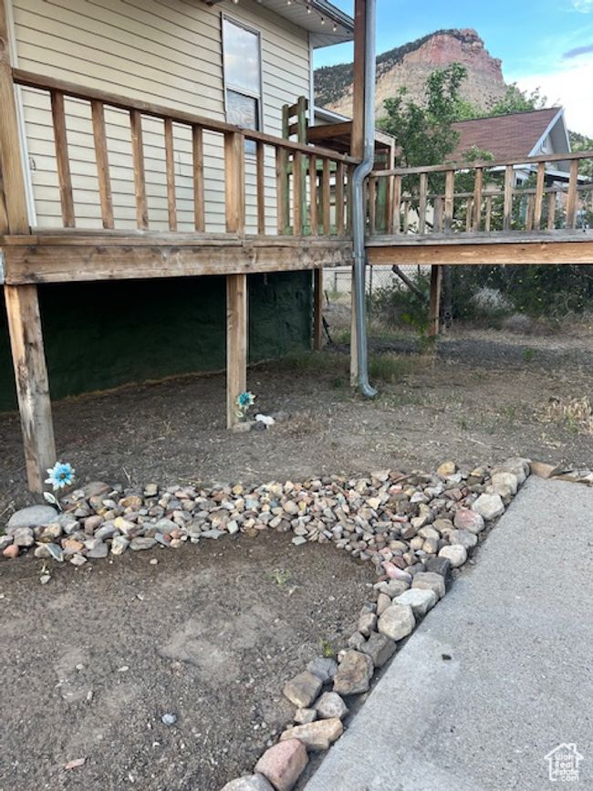 Front of property featuring a deck with mountain view | Image 6