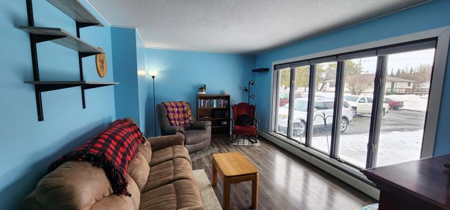 Living room with floor to ceiling windows | Image 6
