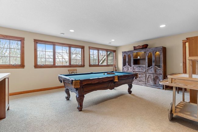 Upper-level billiard /craft room. Large 25' x 15' space. With French doors to upper hallway and access to upper-level full bath. Wire LAN available. | Image 30