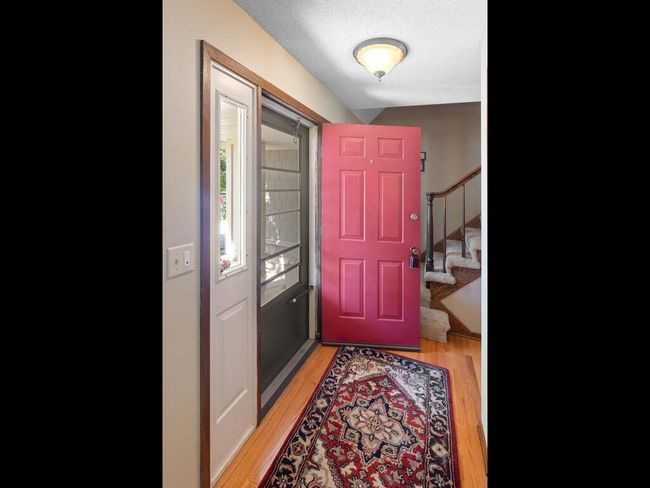 Welcoming Foyer with hardwood floors | Image 7