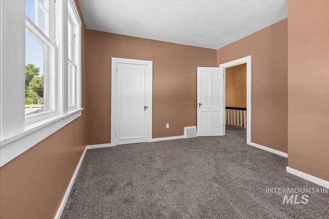 Unfurnished bedroom featuring carpet floors | Image 37