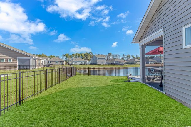 View of yard with a water view | Image 24
