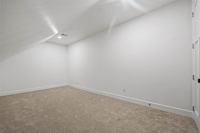 Spacious upstairs game/media room, perfect for entertainment and relaxation. | Image 36
